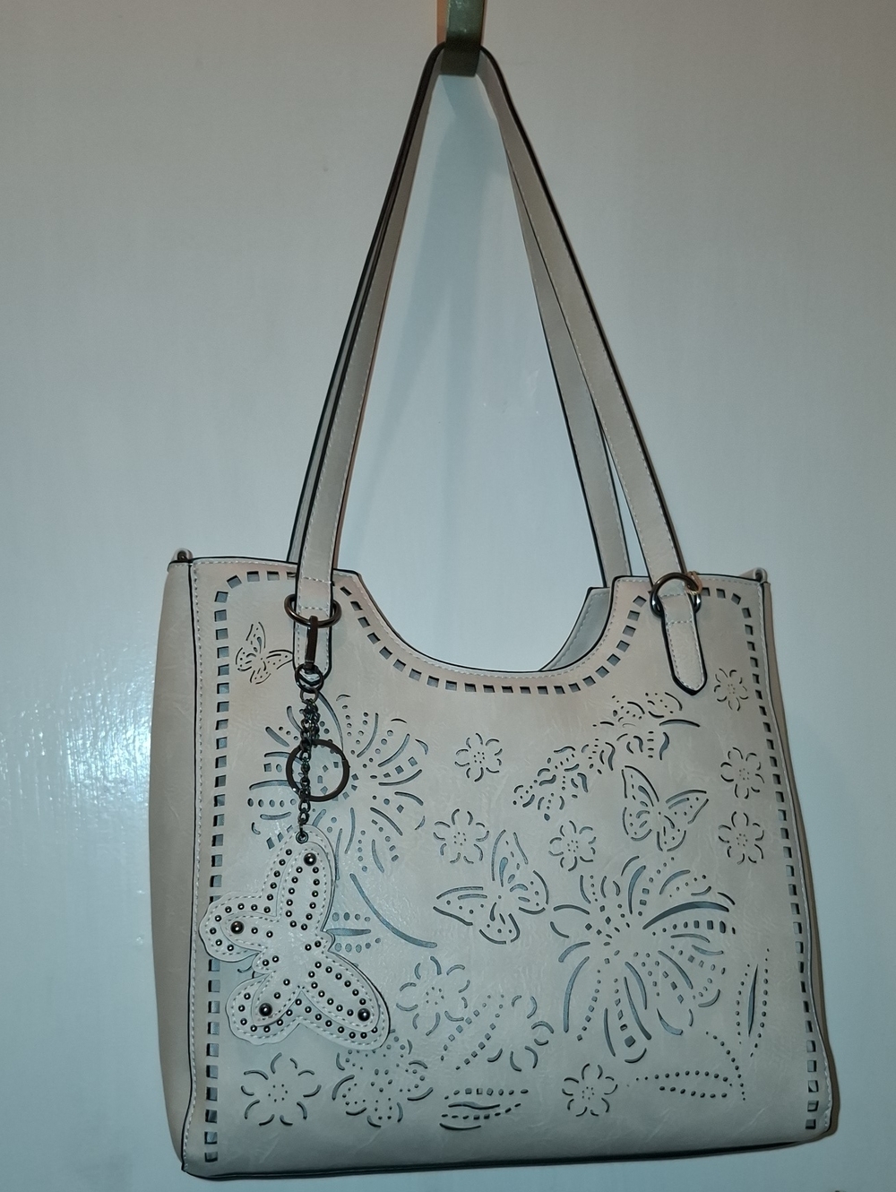 Cream Floral Cutout Shoulder Bag with Butterfly Charm
